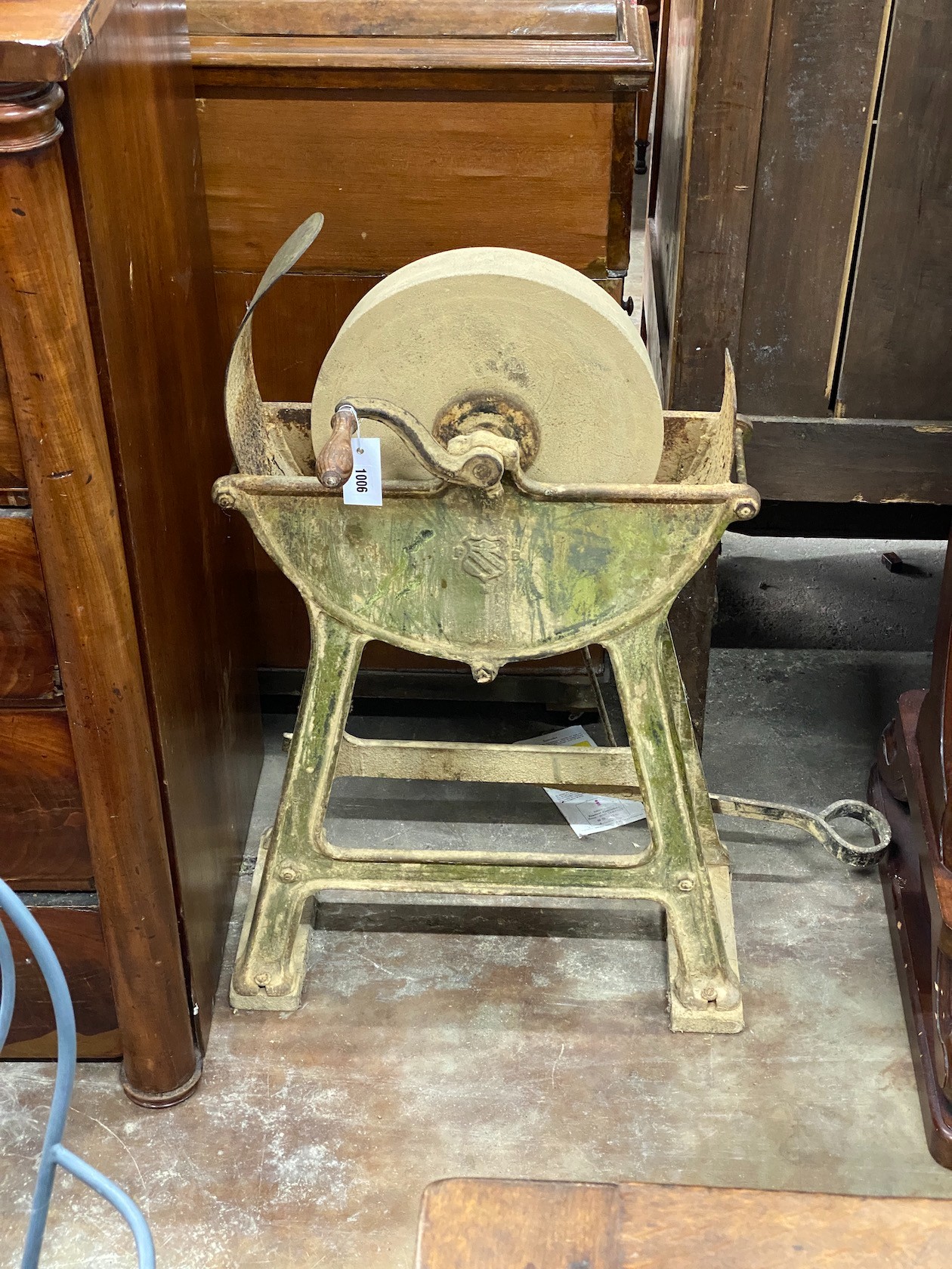 A Victorian cast iron treadle operated whetstone, height 89cm